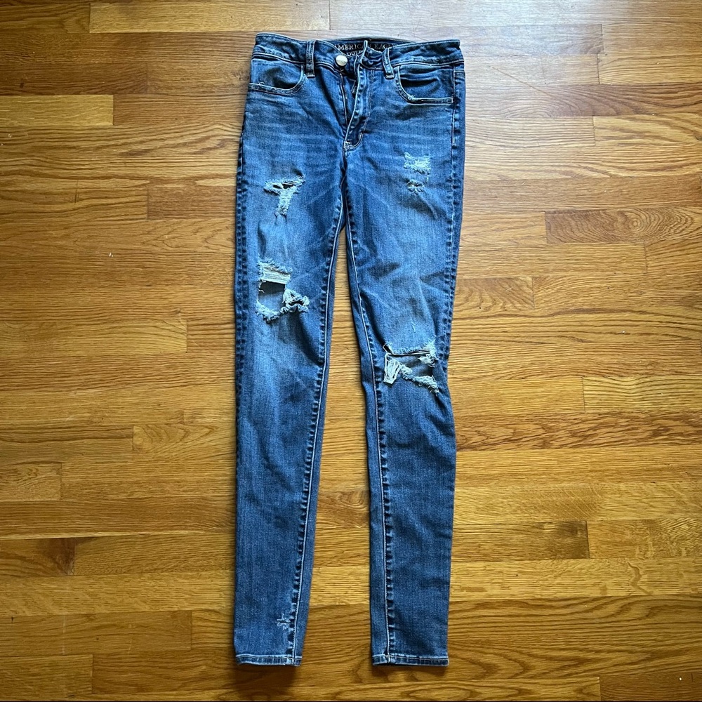 Blue American Eagle high waisted ripped jegging.  **DONATING 9/17**